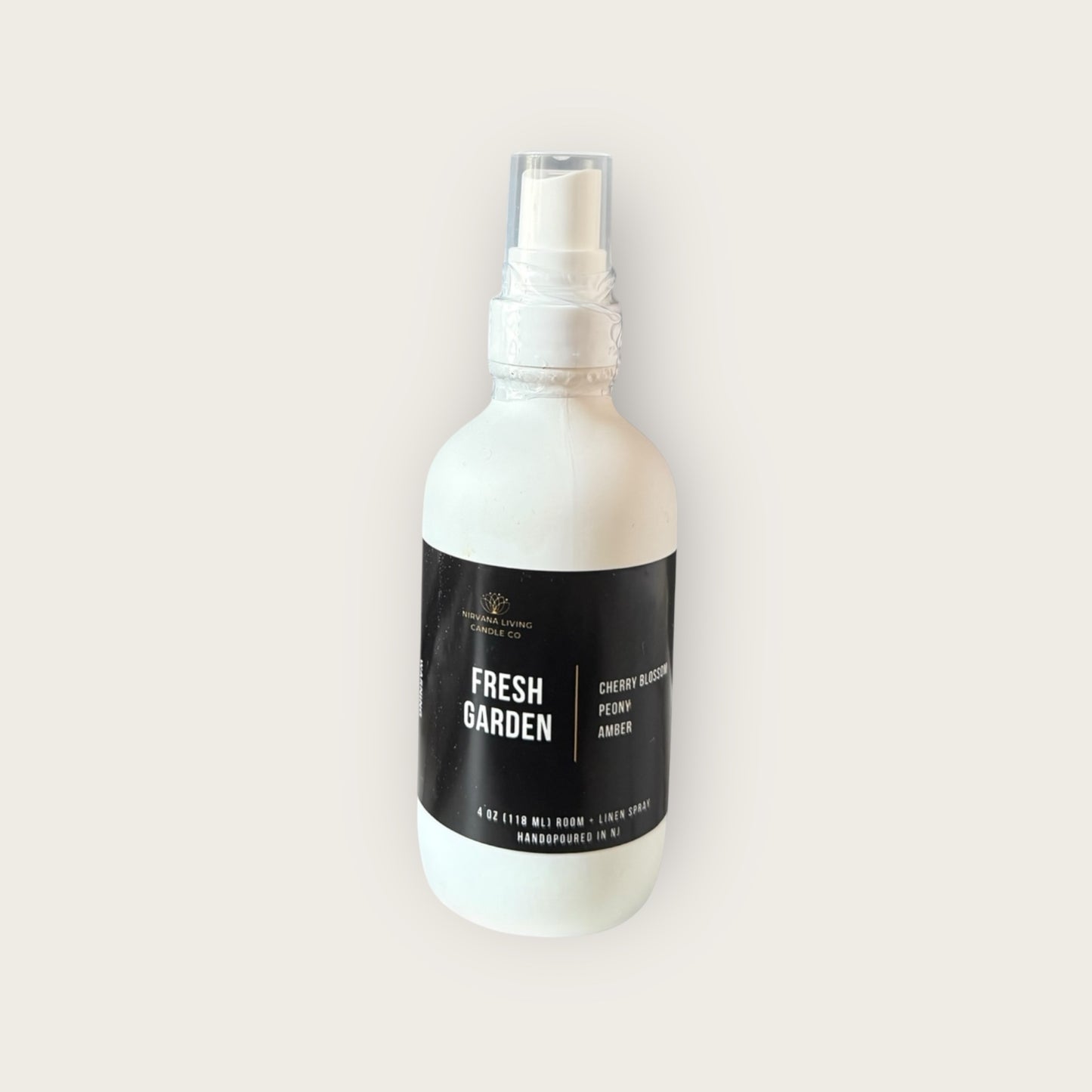 Room and Linen spray in a white spray bottle with a floral scent
