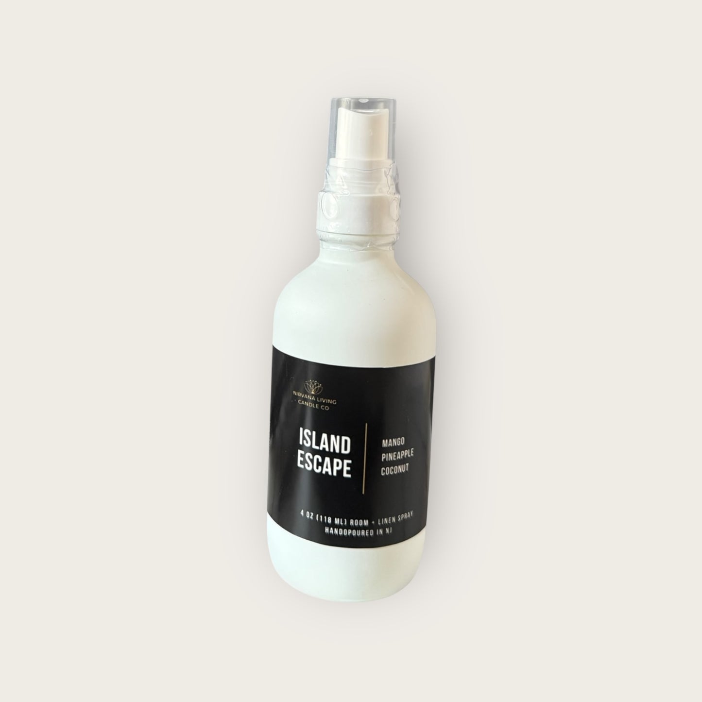 Room and Linen spray in a white spray bottle with a tropical scent