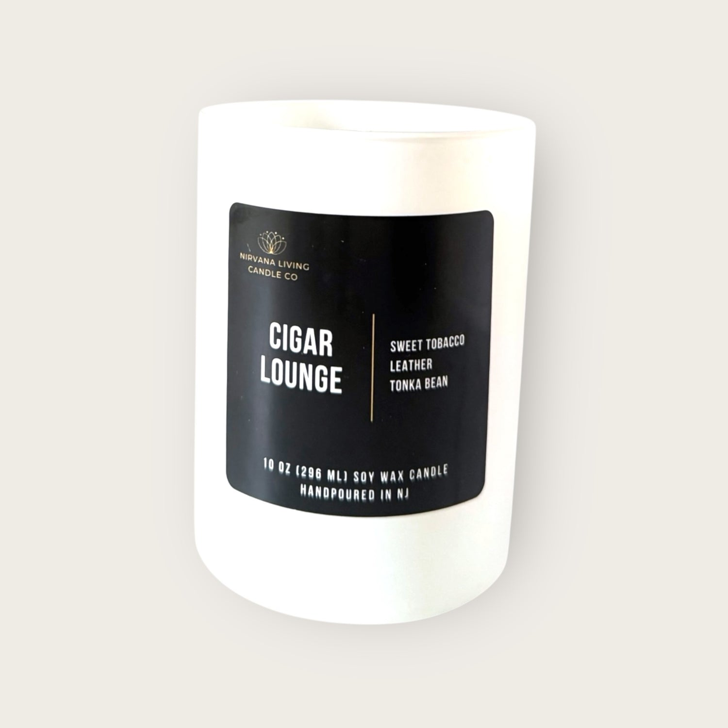 Hand-poured soy candle with a masculine scent in a white jar